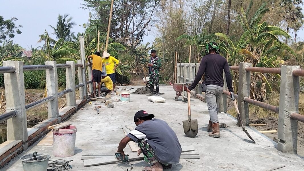 Kolaborasi TNI dan Warga Gowa Bawa Progres Jembatan Garuda Tembus 90 Persen Kolaborasi TNI dan Warga Gowa Bawa Progres Jembatan Garuda Tembus 90 Persen